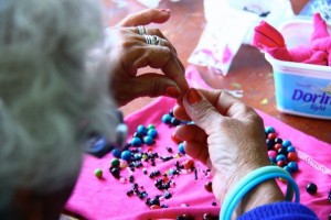Making jewelry to help support their needs