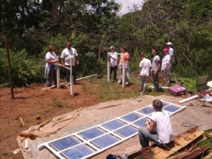 Volunteers from Virginia installed three 70- watt solar panels