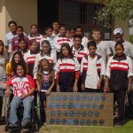 Install a solar electric system at a school so students can use a computer