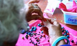 Making jewelry to help support their needs